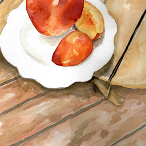 Slices peach on a wooden deck.