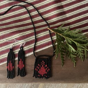 Necklace and earrings in black and red.