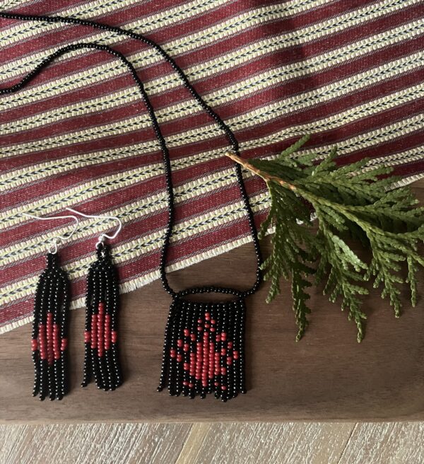 Necklace and earrings in black and red.